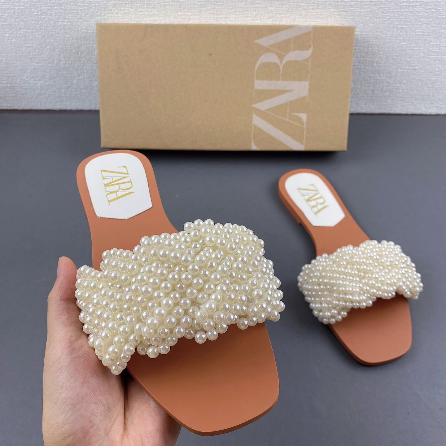 2026/06/1000255076.jpg Zara Pearl Woven Flat Sandals - Image 1